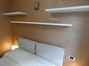 Ένα ή περισσότερα κρεβάτια σε δωμάτιο στο Le papillon du Chatelair