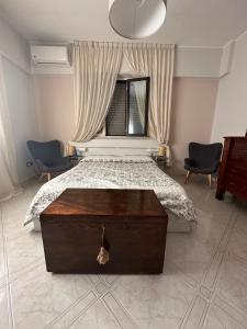 Säng eller sängar i ett rum på Casa di Nonna Mariella