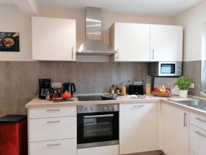 Kuchyň nebo kuchyňský kout v ubytování Ferienhaus Helene