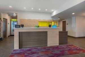a lobby of a hospital with a reception counter at Home2 Suites by Hilton Bangor in Bangor