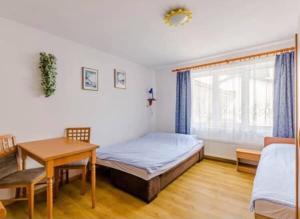 Postel nebo postele na pokoji v ubytování Pokoje Gościnne Irys