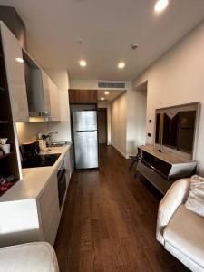 a kitchen with a sink and a refrigerator at Skyland for luxury people 1+1 in Istanbul