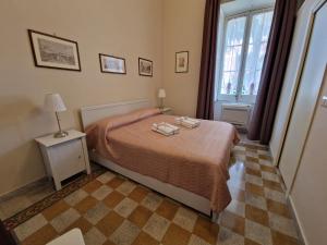 A bed or beds in a room at B&B IL CEDRO
