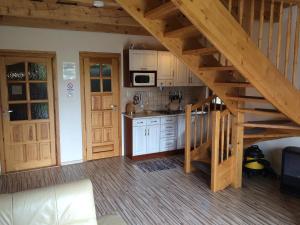 A kitchen or kitchenette at chatyliptov v srdci LIPTOVA