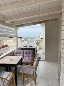Posezení v ubytování Voula Hotel