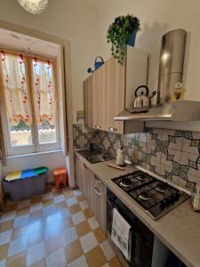 A kitchen or kitchenette at B&B IL CEDRO