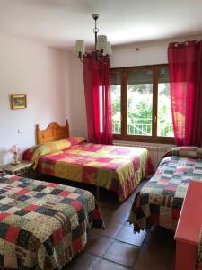Postel nebo postele na pokoji v ubytování Casa Rural Pantano de San Juan