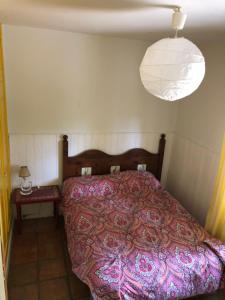 Postel nebo postele na pokoji v ubytování Casa Rural Pantano de San Juan