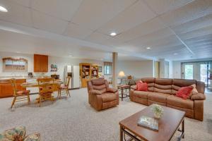 a living room with two couches and a kitchen at The Haven at Welsh Mountain Suites - Apt with Patio! in New Holland