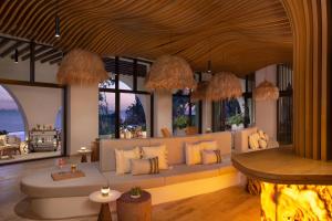 Гостиная зона в Impression Isla Mujeres by Secrets - Adults Only - All Inclusive