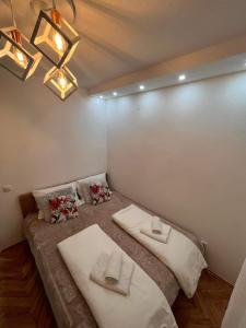Postel nebo postele na pokoji v ubytování Apartman Polo