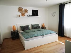 Postel nebo postele na pokoji v ubytování Ferienwohnung Lieblingszeit
