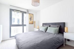 Ένα ή περισσότερα κρεβάτια σε δωμάτιο στο Cocon Villanueva