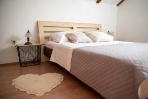 Postel nebo postele na pokoji v ubytování Apartman Milutin