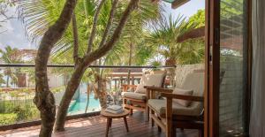 A piscina localizada em Mi Amor Tulum, a Small Luxury Hotel ou nos arredores