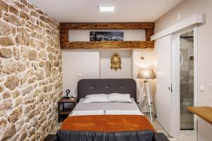 Posteľ alebo postele v izbe v ubytovaní Villa Skoric