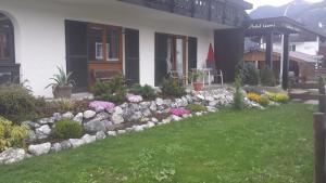 Сад в Gästehaus Carola