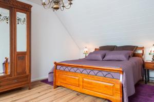 Postel nebo postele na pokoji v ubytování Elbwiesenhaus