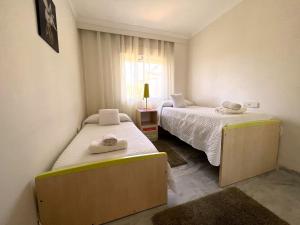 Posteľ alebo postele v izbe v ubytovaní Precioso Apartamento Puerto Banus Marbella + 11 fotografií