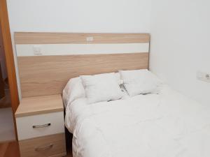 Łóżko lub łóżka w pokoju w obiekcie Vila, 132