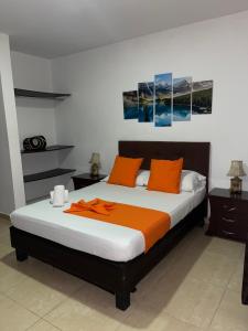Ένα ή περισσότερα κρεβάτια σε δωμάτιο στο Hotel Gran Palacio