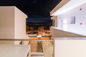 a view from the living room of a house with a view of a car at Summer Feelings in Skala Sotiros