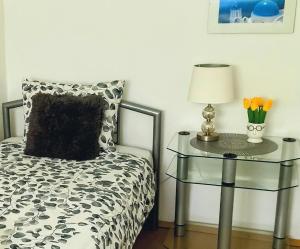 A bed or beds in a room at Atlantis apartman
