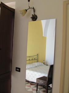 Postel nebo postele na pokoji v ubytování B&B Camera A Sud Tuglie Gallipoli + 9 fotografií