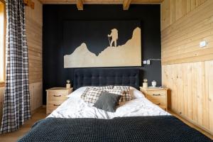 Posteľ alebo postele v izbe v ubytovaní Hacienda Domek Bliźniaczy z Widokiem na Tatry