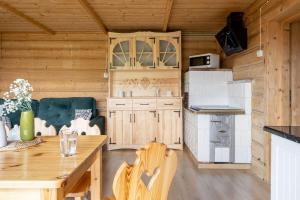 Kuchyňa alebo kuchynka v ubytovaní Hacienda Domek Bliźniaczy z Widokiem na Tatry