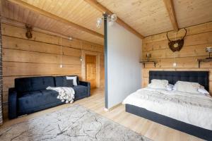 Posteľ alebo postele v izbe v ubytovaní Hacienda Domek Bliźniaczy z Widokiem na Tatry