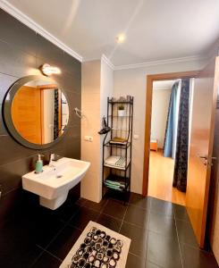 a bathroom with a sink and a mirror at 3-bedrooms apartament Vista Roja in Granadilla de Abona