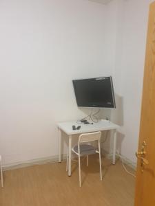 TV a/nebo společenská místnost v ubytování Monteurwohnung bei Nina