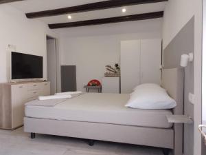 Posteľ alebo postele v izbe v ubytovaní Apartments Ciao Bella city centre with free parking