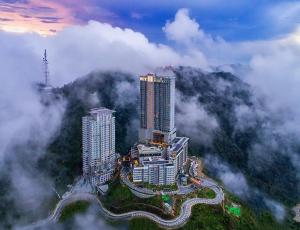 an aerial view of a city in the clouds at Genting HillTop @ Ion Highland Resort in Genting Highlands