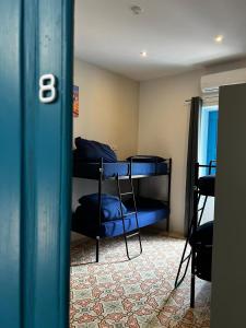 Bookarest Hostel Malta客房内的一张或多张床位