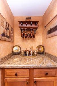 a kitchen with a sink and a counter top at CITY & MOUNTAIN VIEW 5 Mins from downtown Gatlinburg in Gatlinburg