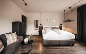 Posteľ alebo postele v izbe v ubytovaní Hotel Löwenhof