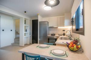 A kitchen or kitchenette at Agro Nostro-Euphorbia two bedroom house