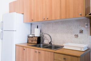 Nhà bếp/bếp nhỏ tại Or Noir Suites +14 ảnh