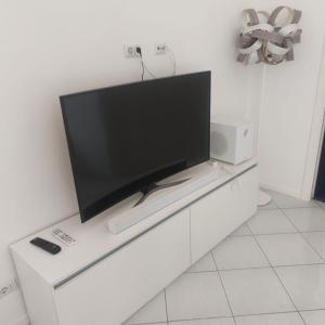 TV a/nebo společenská místnost v ubytování Villa Tesoro