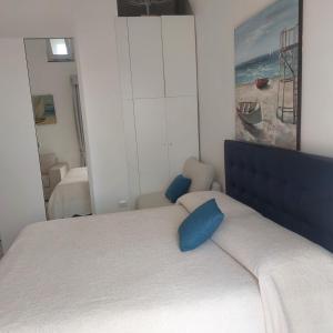 Postel nebo postele na pokoji v ubytování Villa Tesoro