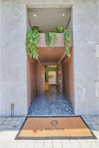 a hallway of a building with a sign that saysstay here at StayHere Casablanca - CFC Urban Signature in Casablanca +72 photos