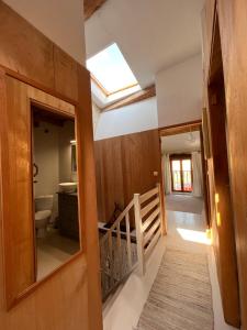 a bathroom with a toilet and a sink and a window at No 10 Vic Fezensac in Vic-Fezensac