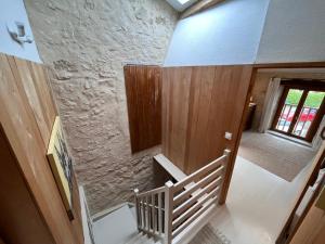 an overhead view of a staircase in a house at No 10 Vic Fezensac in Vic-Fezensac
