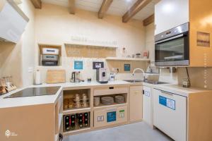 Kuchyň nebo kuchyňský kout v ubytování Casa Amando Eco Boutique House
