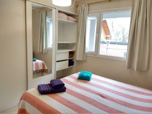 Postel nebo postele na pokoji v ubytování Departamento Ramayon