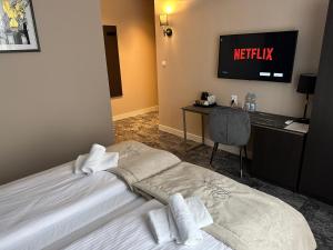 4Wings Apartments客房内的一张或多张床位