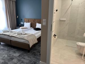 4Wings Apartments客房内的一张或多张床位