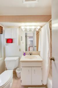a bathroom with a white toilet and a sink at Charming 1 Br Apt Near Ocean & Sutro Heights Park in San Francisco